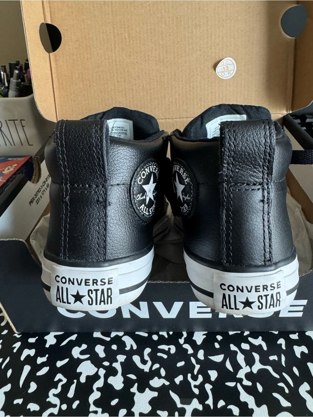 Converse Black and White Leather High Top Sneakers